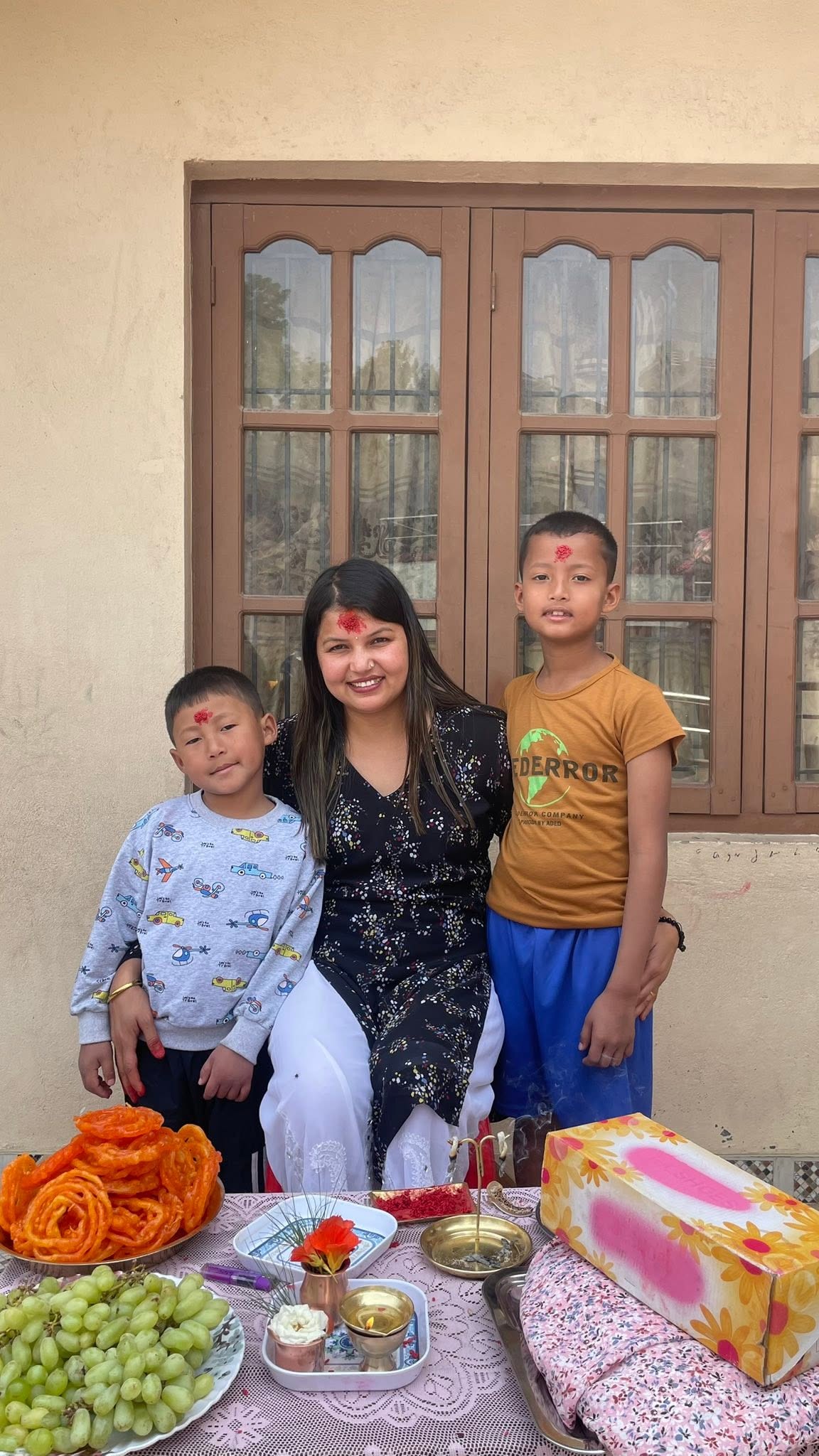 Caregiver with two boys