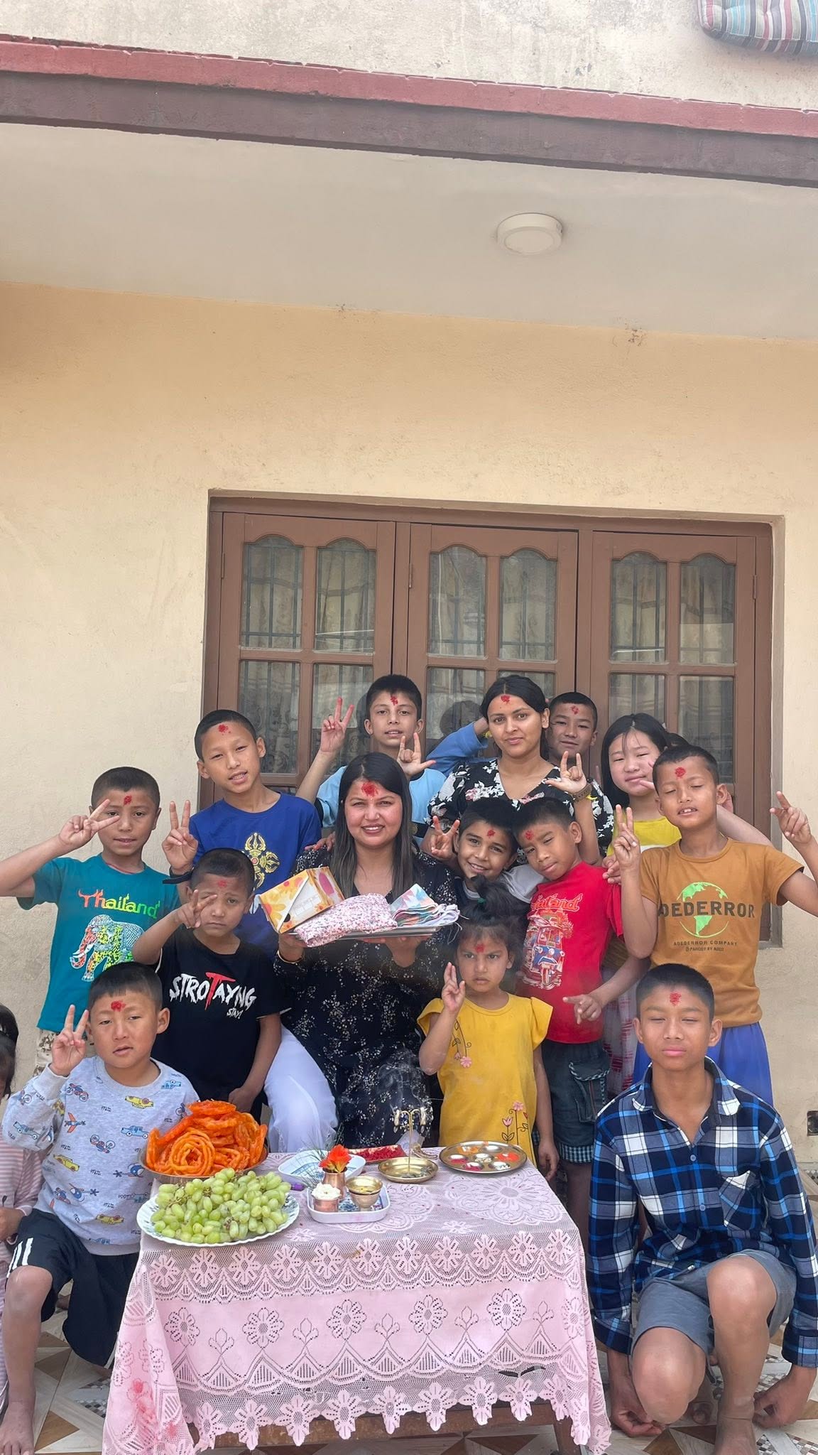 Children with festival offerings