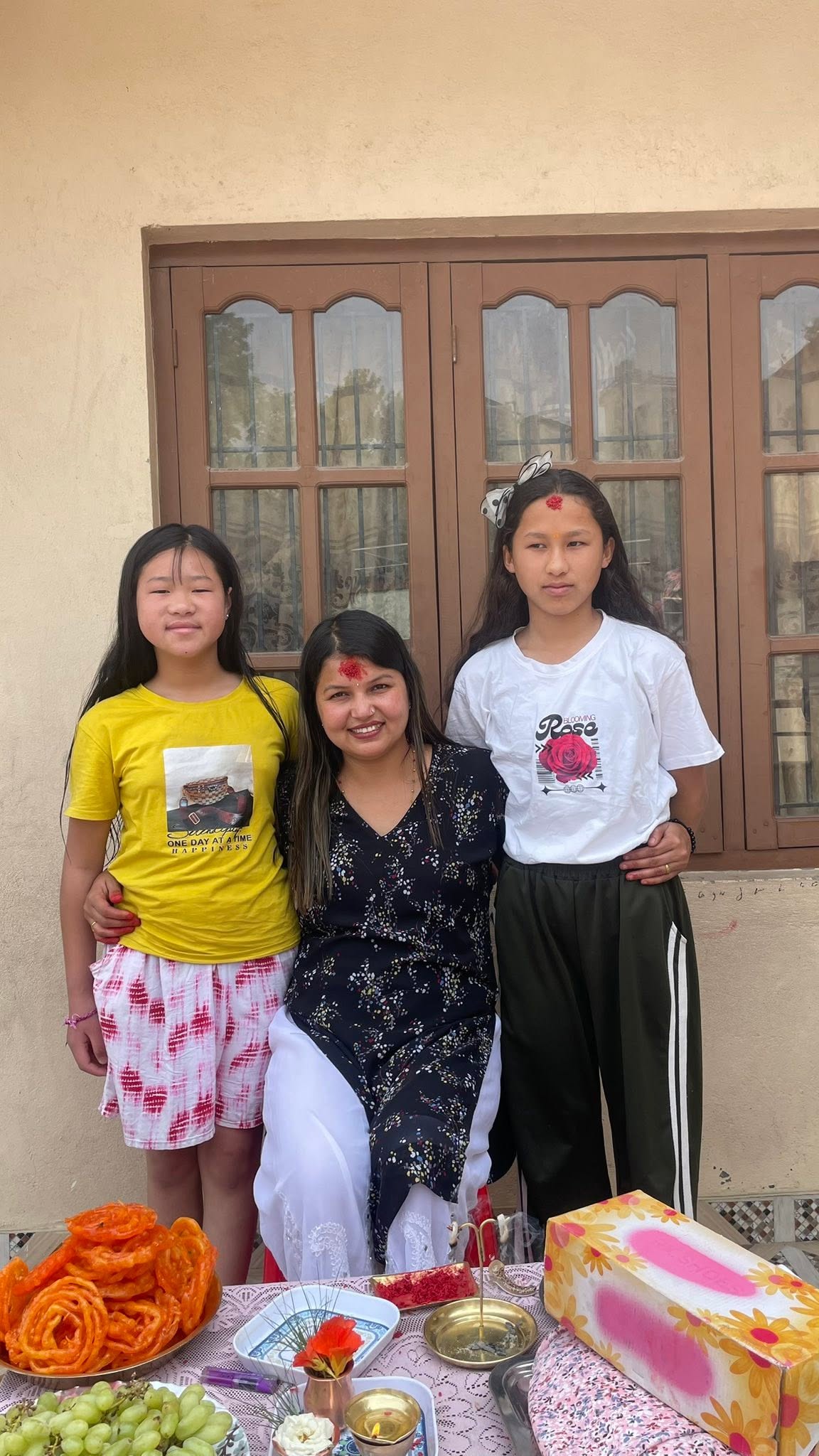 Two girls with caregiver