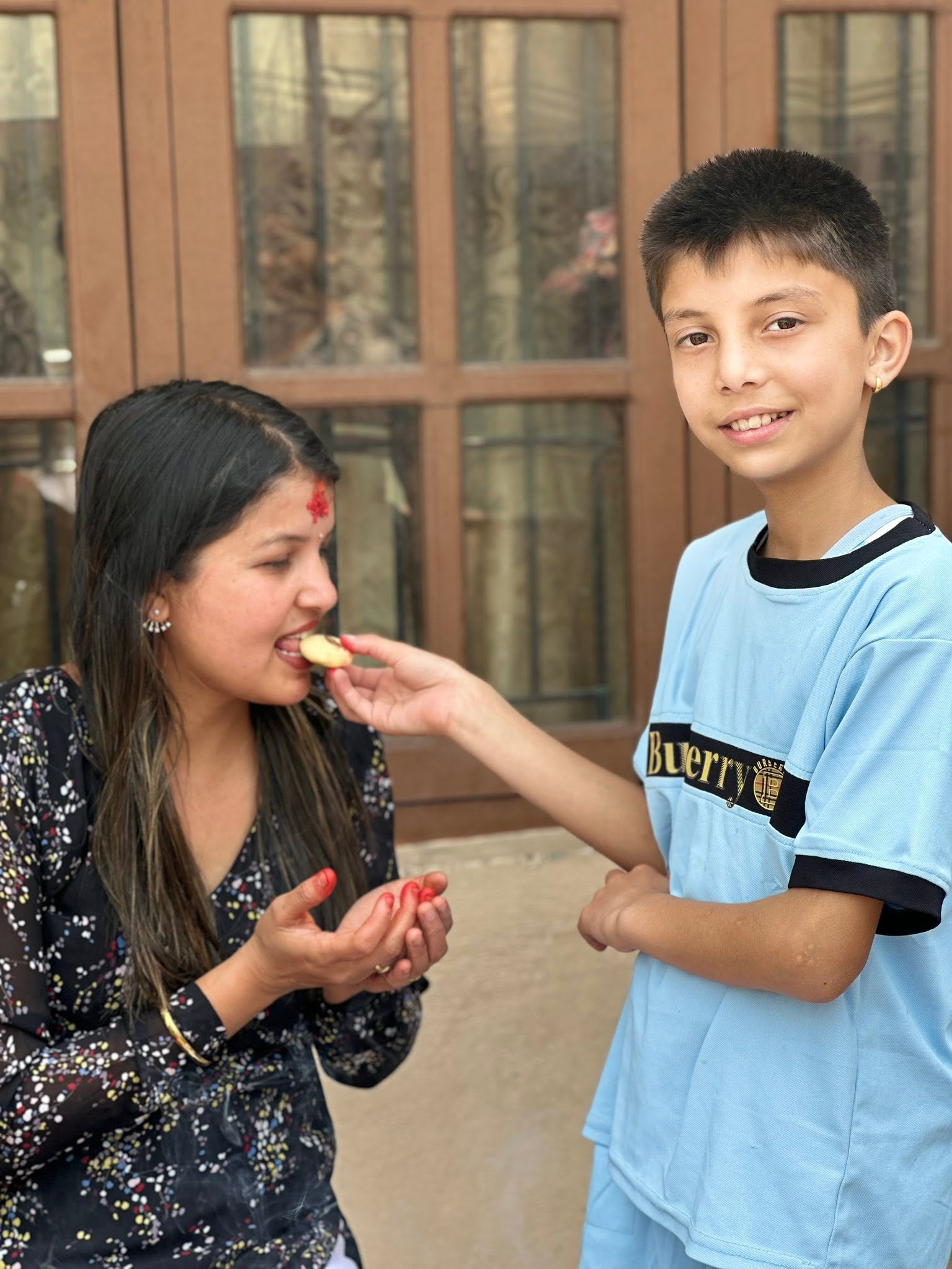 Boy sharing sweets